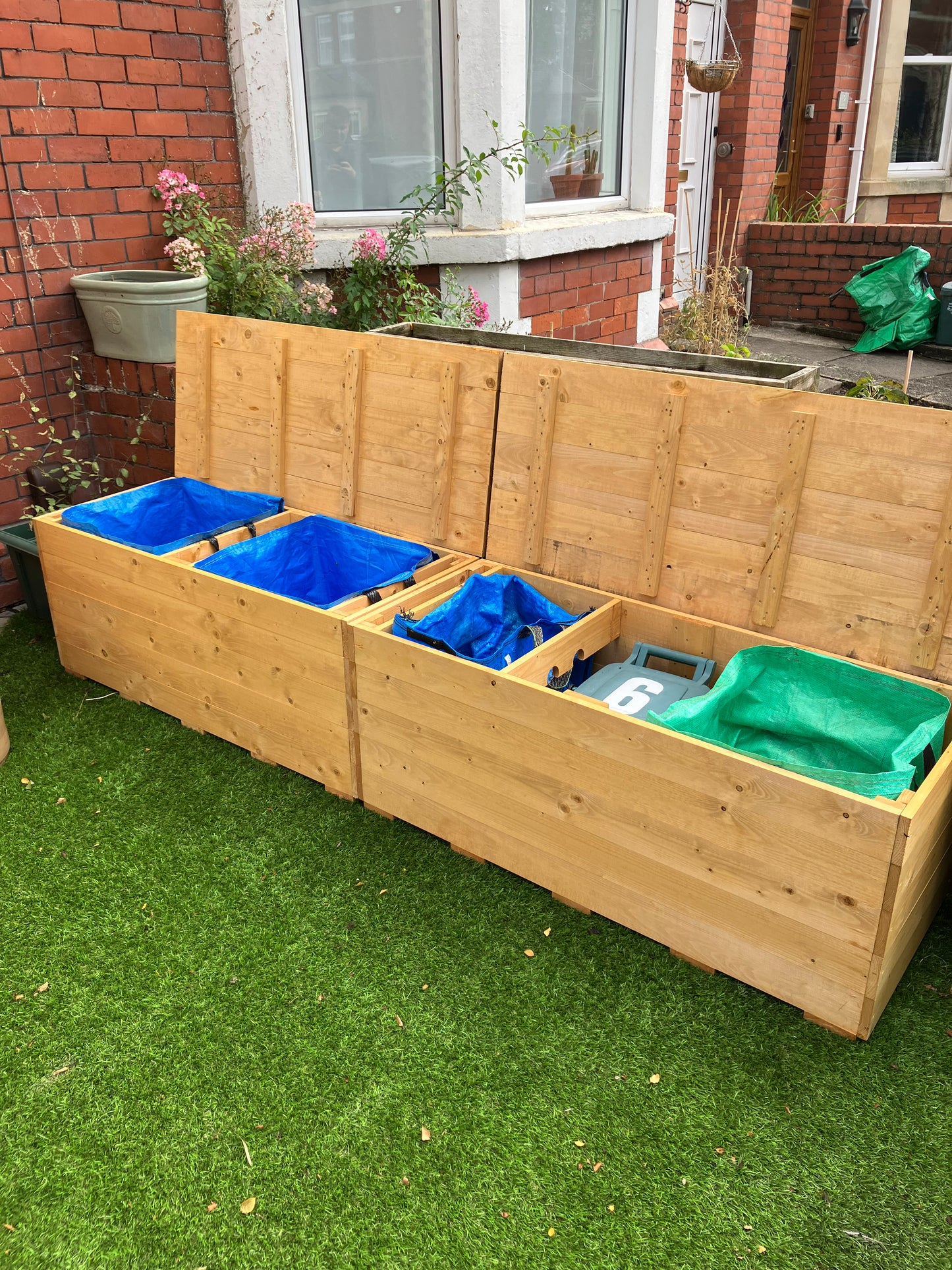 Two Solid Recycling Storage Benches