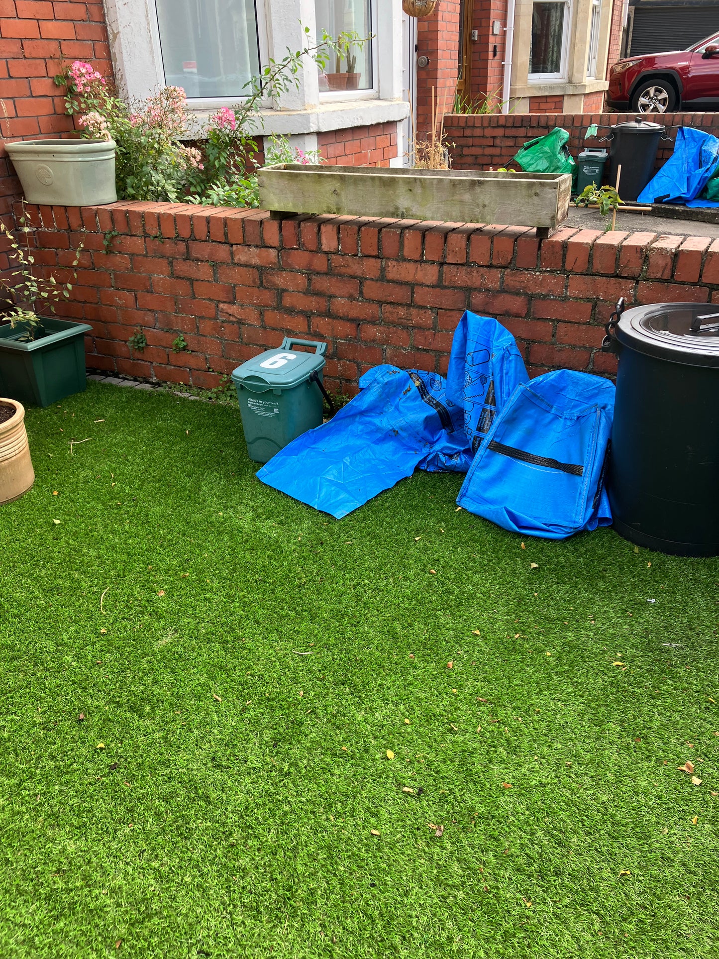 Two Solid Recycling Storage Benches